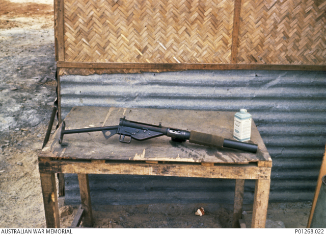 "1967. A Mark VI silenced version of the Sten Mark V submachine gun, carried by forward scouts of Mobile Strike Forces (Mike Forces) and the Australian Special Air Service (SAS) in Vietnam. This particular mark is a cosmetic makeover of the Mark IIS silenced submachine gun. Although these guns could fire automatically, it was recommended that silenced versions only be shot in single-shot mode to prolong the life of the rubber baffles in the silencer inner tube."